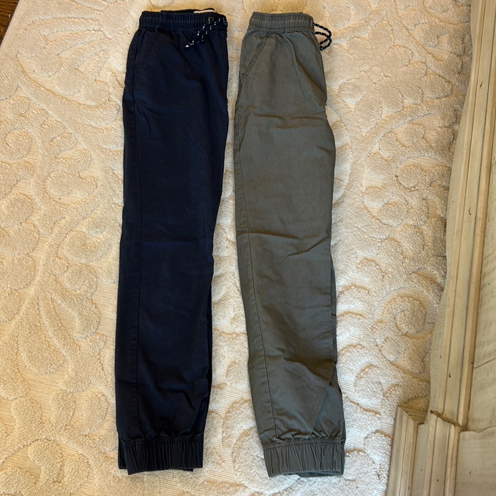 Two pairs of Nautica boys, light, white joggers, khaki type material size 14